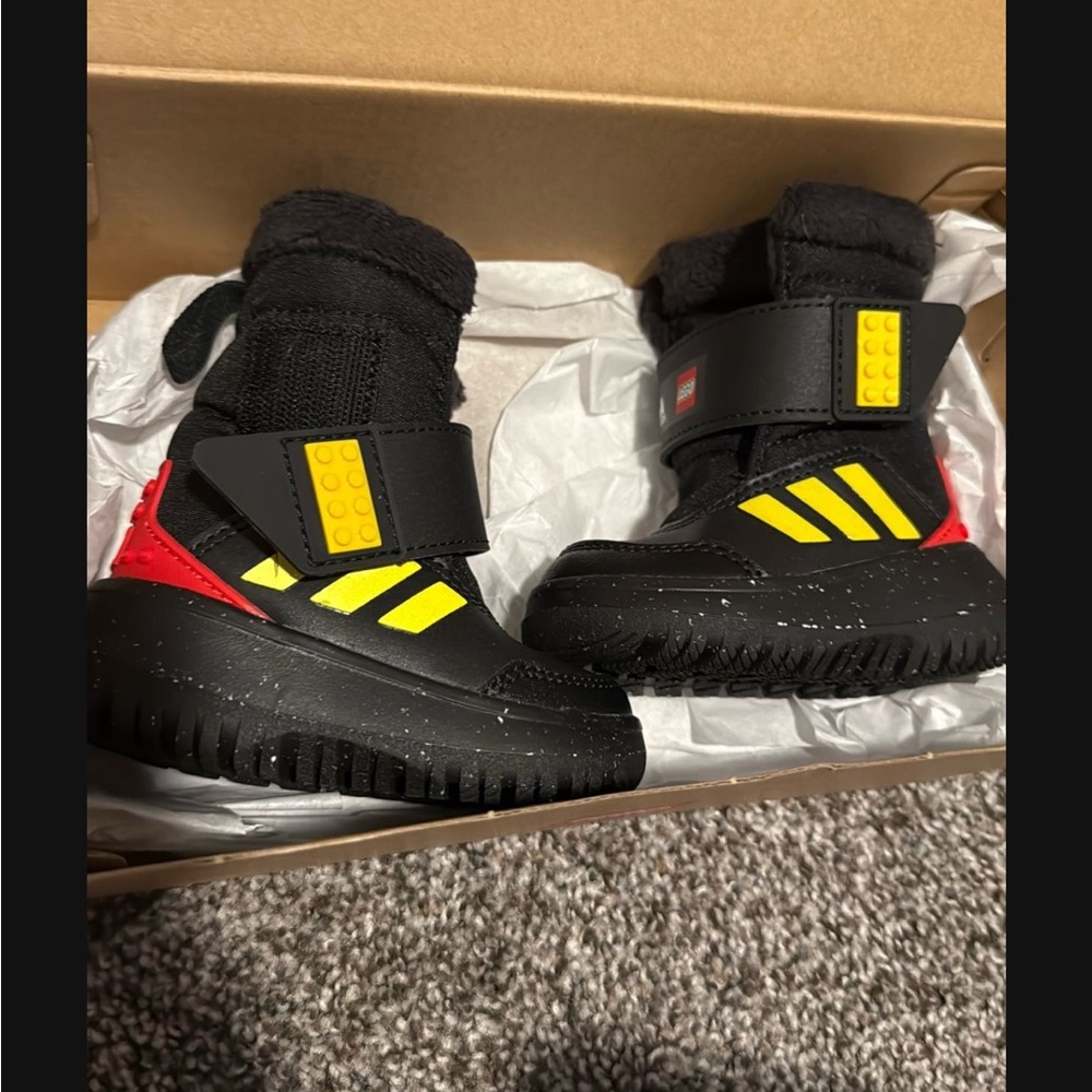 adidas Kids Black and Red Boots with Yellow Stripes